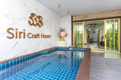 Property logo or sign, Swimming pool, Swimming pool