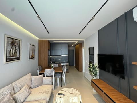 Communal lounge/ TV room, TV and multimedia, Living room, Seating area, Dining area