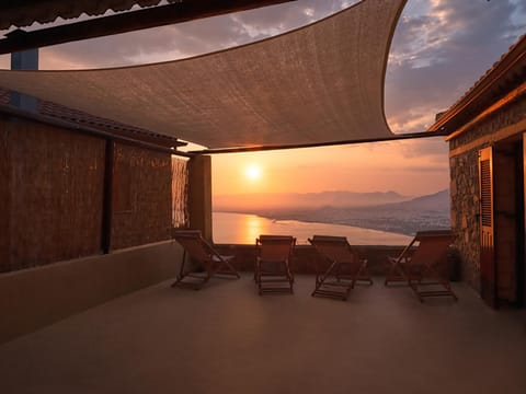 Patio, View (from property/room), Balcony/Terrace, Seating area, City view, City view, Sea view, Sunset