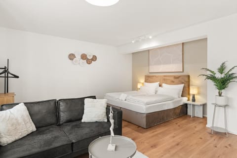 Bed, Living room, Seating area, Bedroom