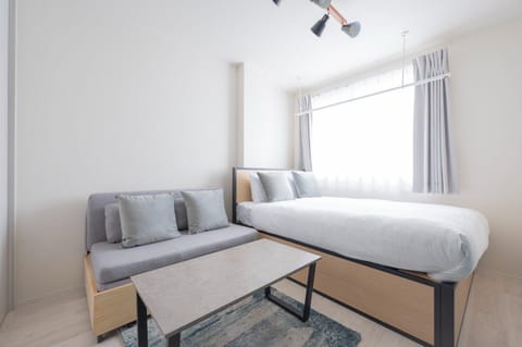 Bed, Seating area, Bedroom