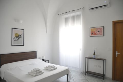 Bed, Photo of the whole room, Bedroom, towels, air conditioner