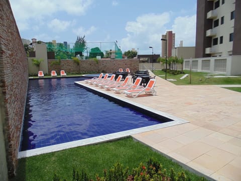 Property building, Day, Pool view, Swimming pool, sunbed
