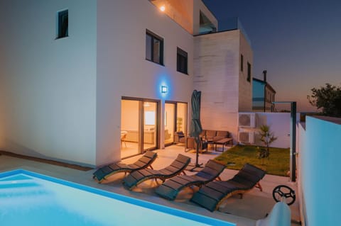 Property building, Night, Swimming pool