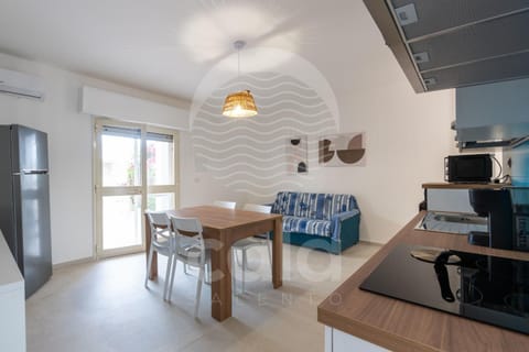 Kitchen or kitchenette, Living room, Seating area, Dining area, air conditioner
