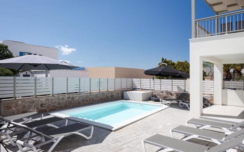 Patio, Day, Balcony/Terrace, Pool view, Swimming pool, sunbed