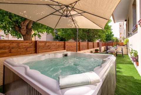 Property building, Patio, Natural landscape, Hot Tub