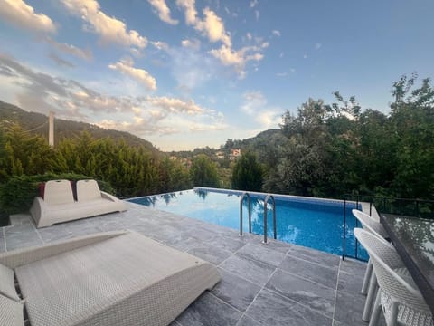 Natural landscape, Mountain view, Swimming pool, sunbed