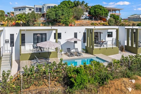 Property building, Patio, Day, Natural landscape, View (from property/room), Pool view, Swimming pool, Location, sunbed