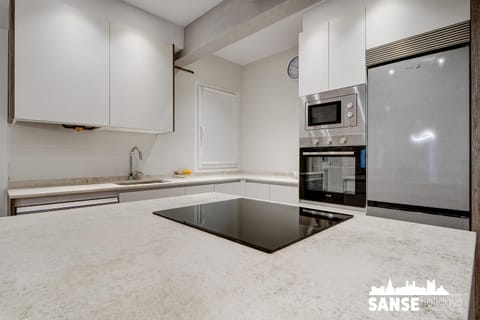 Kitchen or kitchenette, oven, stove