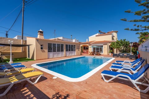Property building, Living room, Swimming pool