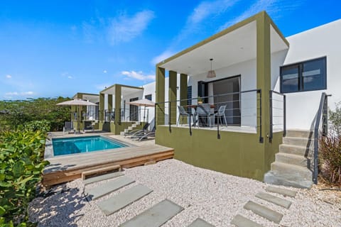 Property building, Patio, Day, Natural landscape, View (from property/room), Pool view, Swimming pool, sunbed