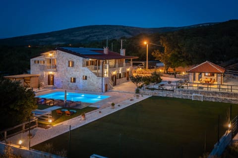 Property building, Night, Natural landscape, Mountain view, Pool view, Swimming pool, sunbed