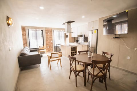Kitchen or kitchenette, Living room, Seating area, Dining area