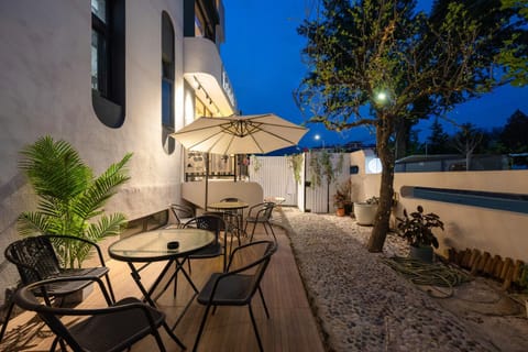 Property building, Patio, Night, Dining area
