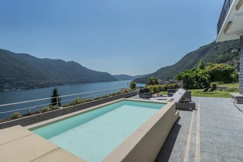 Nearby landmark, Day, Natural landscape, Lake view, Mountain view, Pool view, Swimming pool, sunbed