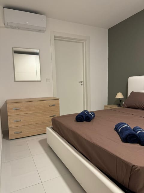 Photo of the whole room, Bedroom, towels, air conditioner