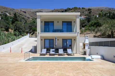 Property building, Patio, Off site, Day, View (from property/room), Balcony/Terrace, Mountain view, Pool view, Swimming pool, sunbed
