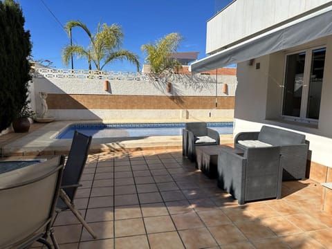 Balcony/Terrace, Seating area, Pool view, Swimming pool