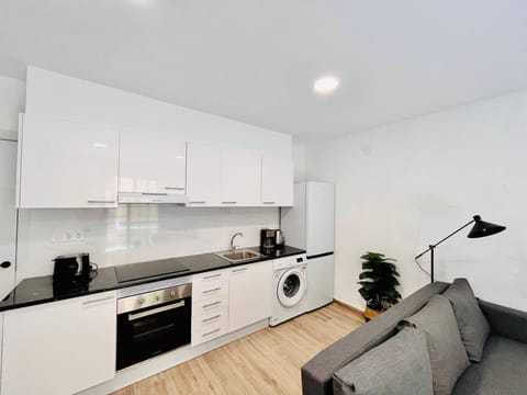 Balcony/Terrace, Kitchen or kitchenette, Living room, Seating area, Dining area, oven, stove, toaster, washing machine