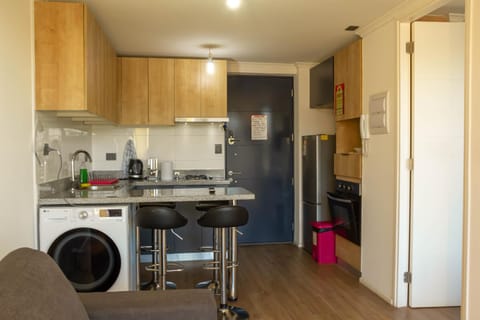 Kitchen or kitchenette, Dining area, oven, stove, washing machine, dryer