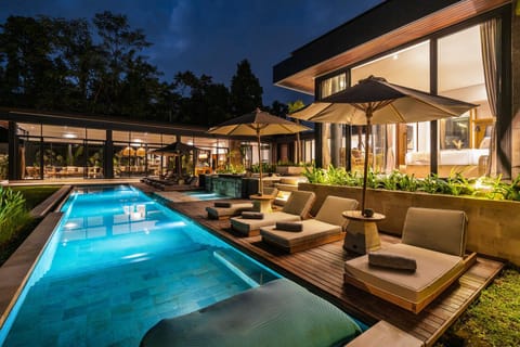 Property building, Night, View (from property/room), Seating area, Pool view, Swimming pool, sunbed