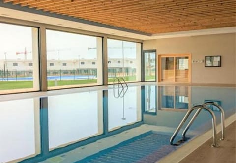 Property building, Living room, Swimming pool