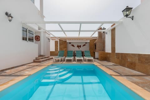 Property building, Living room, Swimming pool