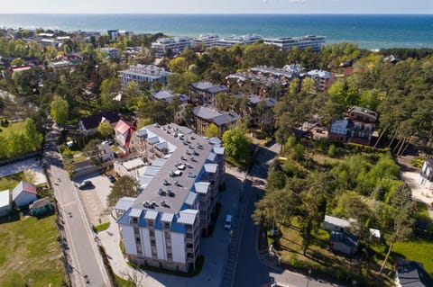 Property building, Day, Neighbourhood, Natural landscape, Bird's eye view, City view, Sea view, Street view, Parking