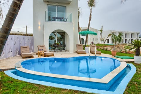 Property building, Patio, Day, Pool view, Swimming pool
