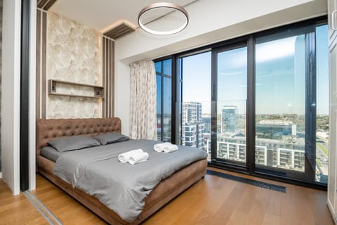 Bed, Balcony/Terrace, towels, air conditioner