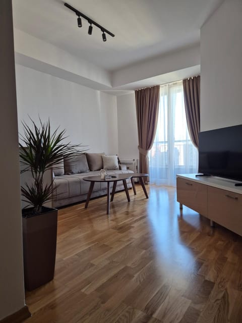 Bed, TV and multimedia, Living room, Seating area