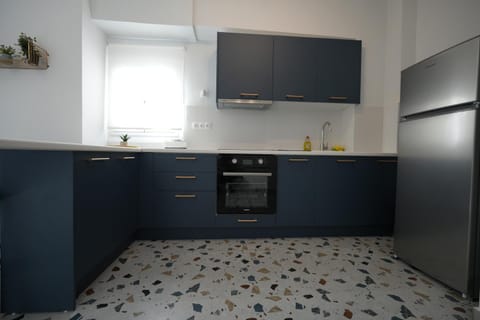Kitchen or kitchenette, oven, stove