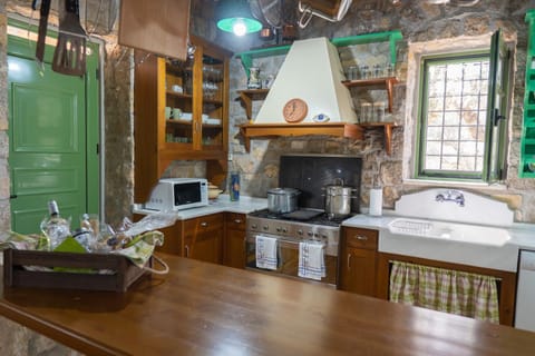 Kitchen or kitchenette, stove