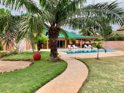 Property building, Patio, Garden, Pool view, Swimming pool, sunbed