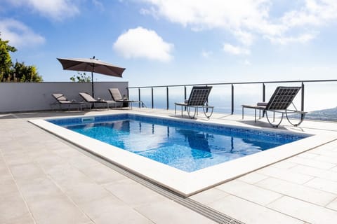 Patio, Natural landscape, Pool view, Sea view, Swimming pool, sunbed