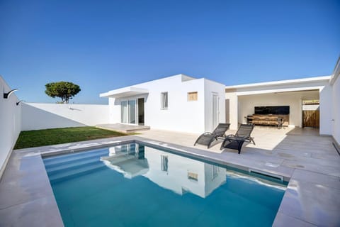 Property building, Living room, Swimming pool