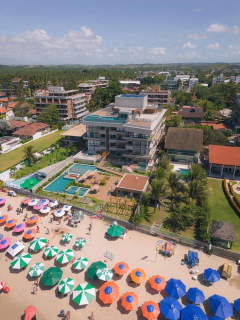 Property building, People, Natural landscape, Beach, Pool view, Sea view, Swimming pool, Parking, sunbed
