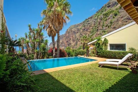 Property building, Living room, Swimming pool