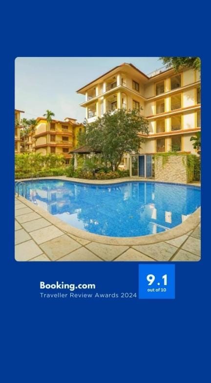 Property building, Text overlay, Pool view, Swimming pool, sunbed