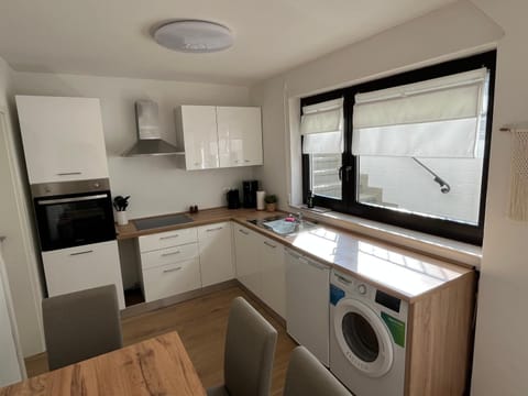 Kitchen or kitchenette, dishwasher, washing machine