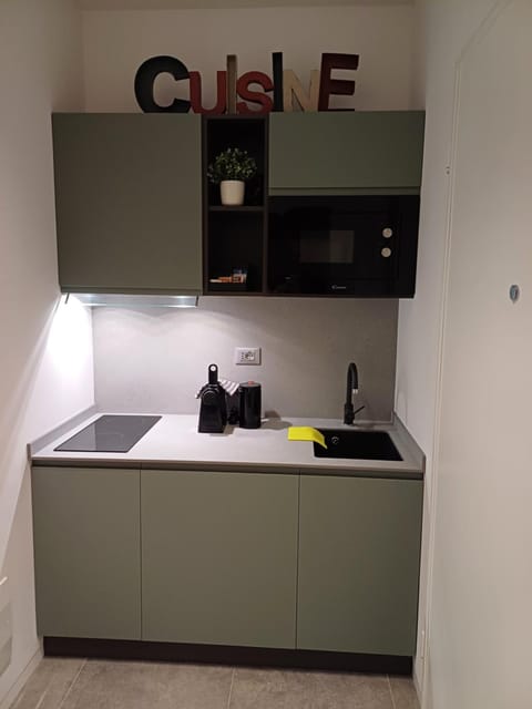 Kitchen or kitchenette, stove