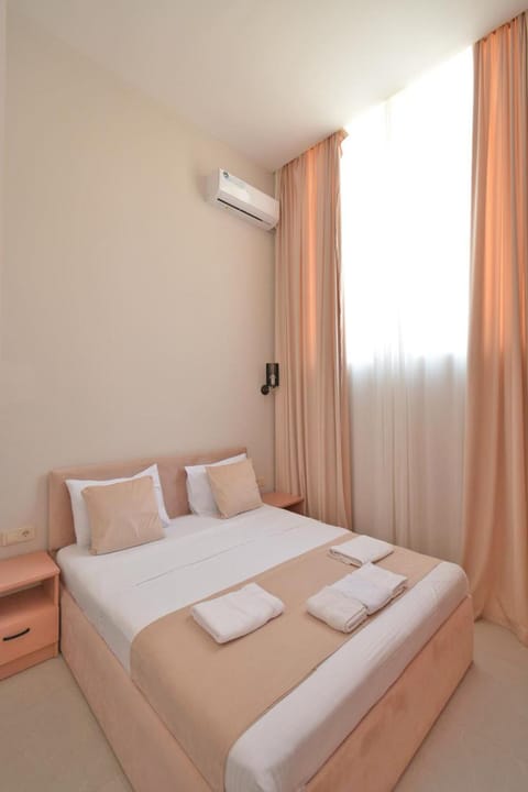 Bed, Photo of the whole room, Bedroom, towels, air conditioner