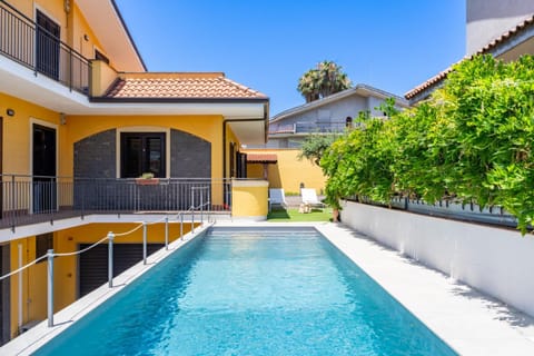 Property building, Day, Pool view, Swimming pool