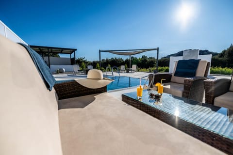 Patio, Day, Seating area, Pool view, Swimming pool, sunbed