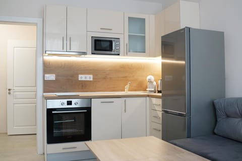 Kitchen or kitchenette, stove