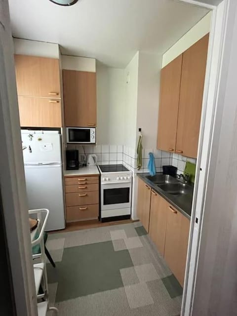 Kitchen or kitchenette, oven, stove, toaster