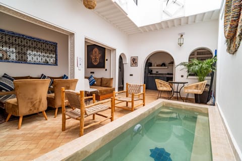 Patio, Living room, Seating area, Dining area, Pool view, Swimming pool, sunbed
