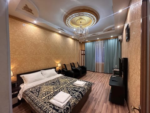 Bed, TV and multimedia, Bedroom, towels, wardrobe, air conditioner