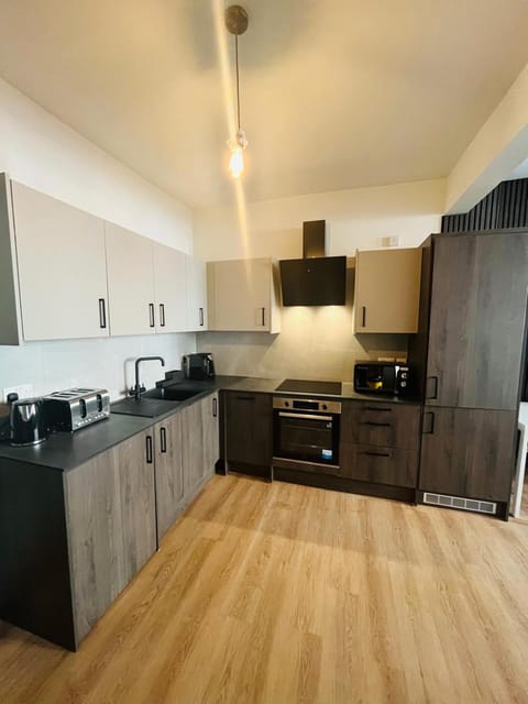 Kitchen or kitchenette, oven, stove, toaster
